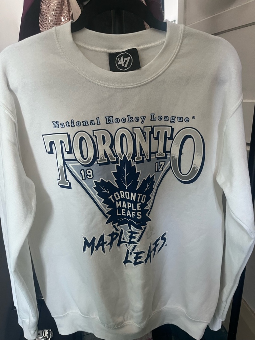 Officially Licensed NHL White Toronto Maple Leafs Crewneck with Navy Crest Print